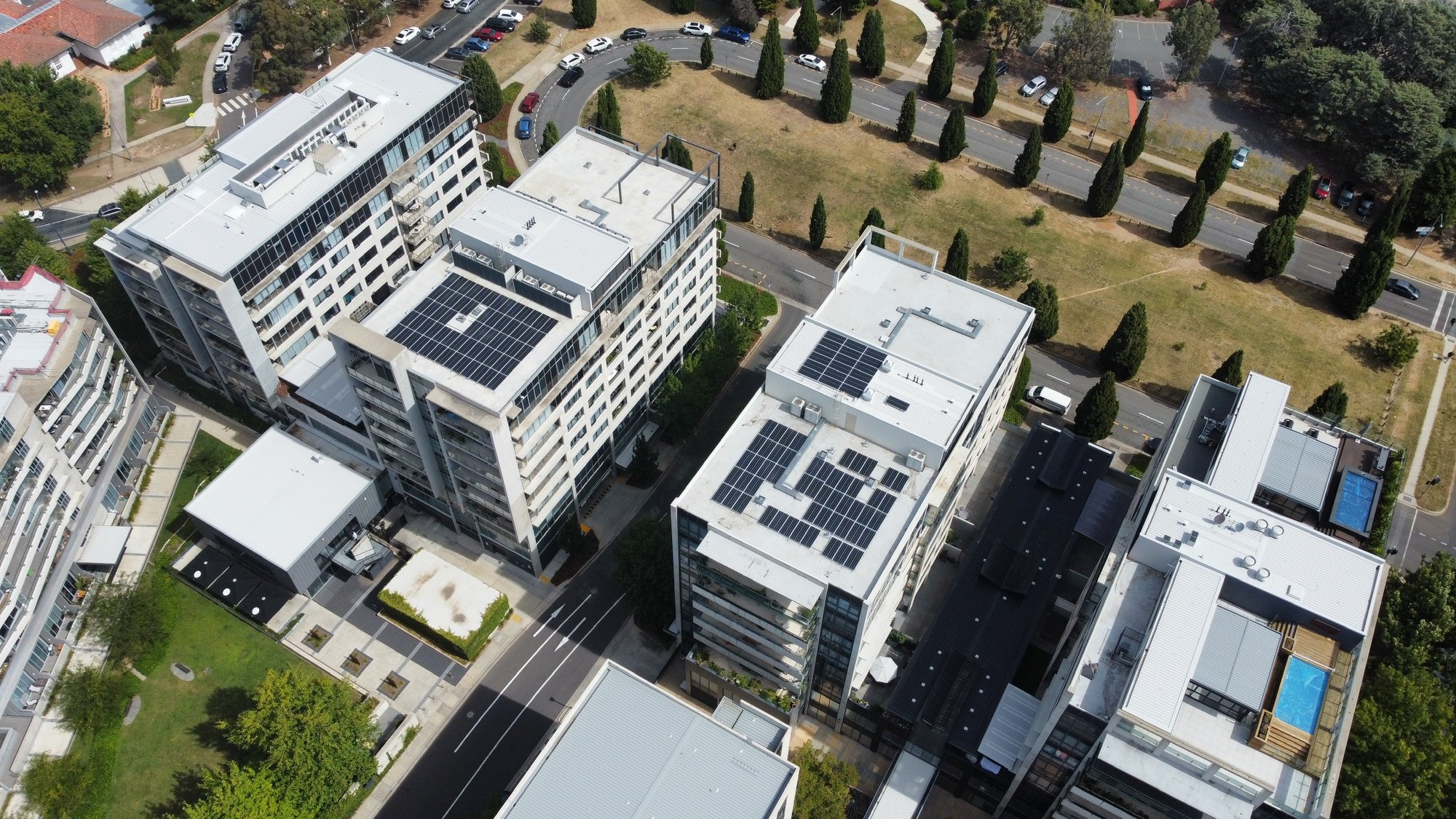 Aerial of Doma hotels and the National Archives rooftop solar arrays in the ACT