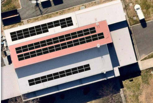 Aerial of rooftop solar arrays at AFP Majura
